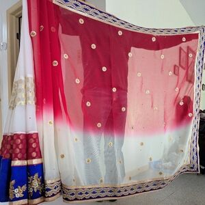 Elegant Red, White, Gold and Blue Embroidered Georgette Saree With Blue Blouse